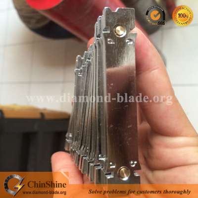 Magnetic welding holder for diamond core bit segments retipping magnets